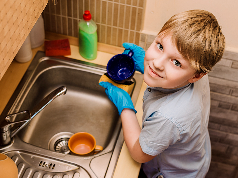 Boy doing chores