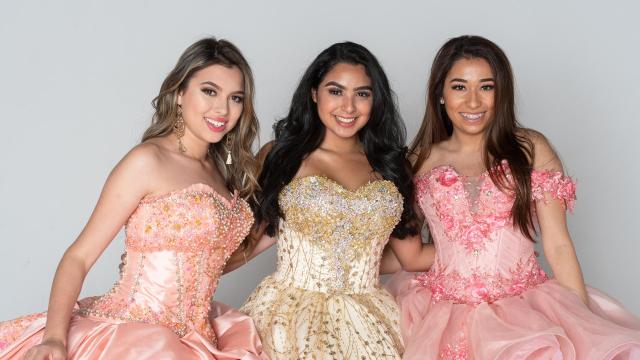 The Significance of Quinceañeras Group of three teenage hispanic girls wearing quinceanera dresses