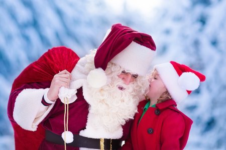 From parades to photo ops, these are the best places to see Santa in the DMV Santa Claus and children opening presents in snowy forest. Kids and father in Santa costume and beard open Christmas gifts. Little girl helping with present sack. Xmas snow and winter fun for family.