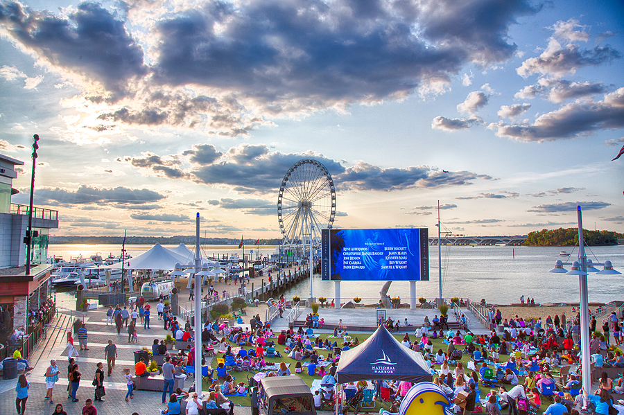 10 of the best of Washington, DC, with these must-do summer experiences A family enjoying family-friendly summer experiences in the DC area at the waterfront