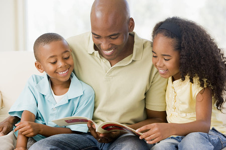 Dad reading to kids during National Family Literacy Month